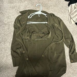 Long sleeved blouse with a laced up bralette.